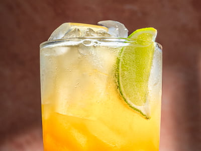 Sunshine in a glass! Mango, pineapple, lime and sparkling water.