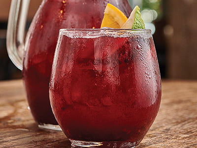 Camarena Tequila, pomegranate, fresh lime and A signature blend of Merlot, mixed agave nectar. berries and apple with a squeeze of orange and lime. Each pitcher pours 2–3 servings. Great for sharing!