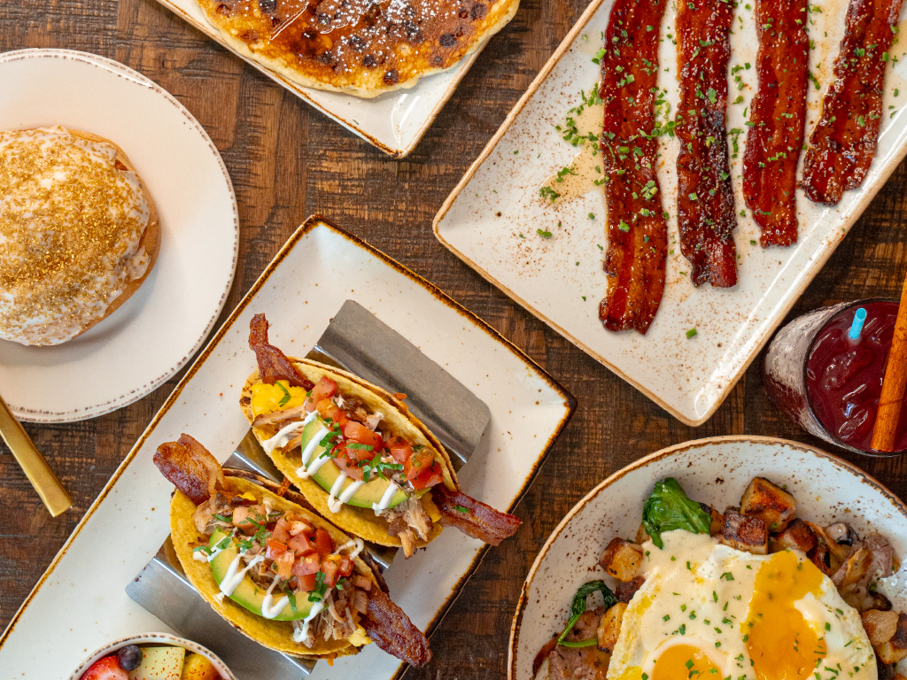 Table full of First Watch Holiday Seasonal Menu Items